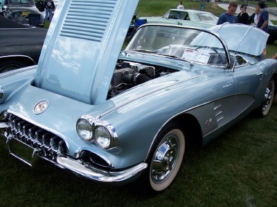 1972 Ford Ranchero - A light blue 1958 Chevrolet Corvette convertible is displayed with its hoods open at an outdoor event.