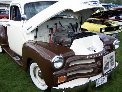 1972 Ford Ranchero - A classic Chevrolet pickup truck with its hood open, displayed at an outdoor event.