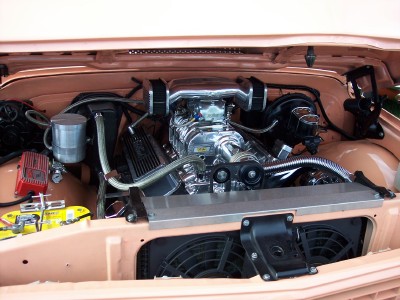 1972 Ford Ranchero - Close-up of a custom engine bay a prominent supercharger and polished components.