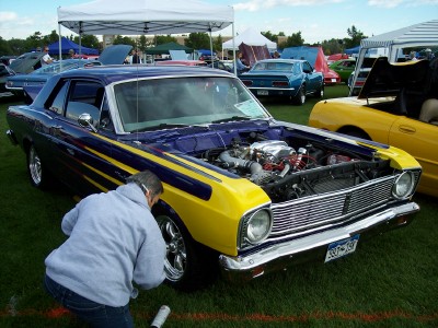 1972 Ford Ranchero - Customized Ford Falcon at an outdoor car show with other vehicles visible.