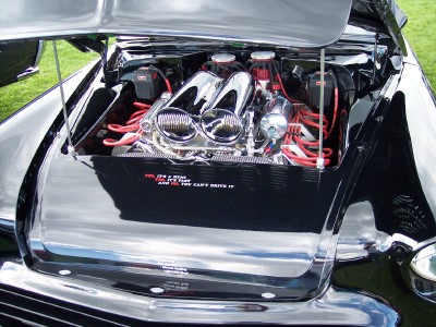 1972 Ford Ranchero - Custom V8 engine bay with chrome details and red wiring, hood is open.