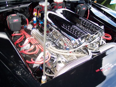 1972 Ford Ranchero - This engine has a lot of chrome and custom parts, including red spark plug wires and dual carburetors.