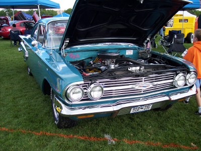 1972 Ford Ranchero - 1960 Chevrolet Biscayne on display at an outdoor car show.