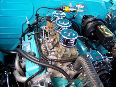 1972 Ford Ranchero - Engine bay details with triple carburetors and chrome accents.