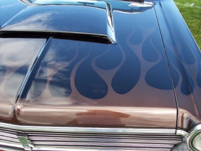 1972 Ford Ranchero - Custom flame graphics adorn the hood of a 1972 Ford Ranchero with a hood scoop.