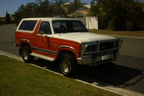 1982 Ford Bronco - This two-tone Ford Bronco is parked curbside on a sunny day.