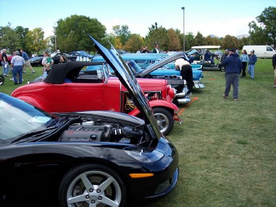 1972 Ford Ranchero - Several cars are displayed with their hoods open at an outdoor event.