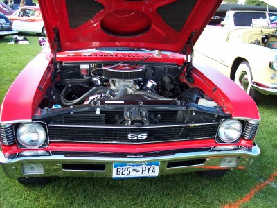 1972 Ford Ranchero - A red 1972 Chevrolet Nova SS is displayed with its hood open, revealing the engine and a Colorado license plate.