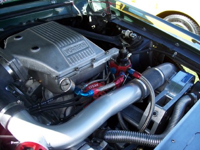 1972 Ford Ranchero - The engine bay features a Vortech supercharger, MSD fuel components, and custom intake piping.