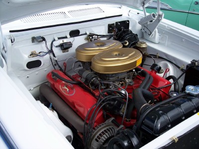 1972 Ford Ranchero - The engine bay features a V8 engine with dual carburetors and prominent gold air cleaner housings.