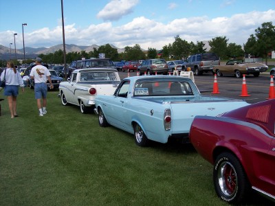 1972 Ford Ranchero - A light blue 1966 Ford Ranchero is parked on a grassy field at an outdoor car show.