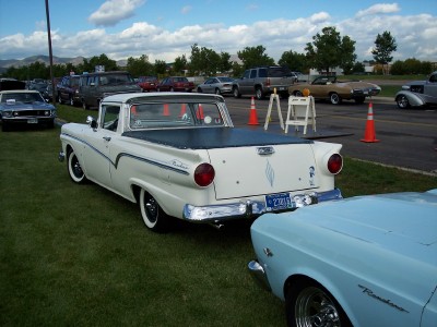 1972 Ford Ranchero - A white 1959 Ford Ranchero is parked on the grass next to other vehicles at an outdoor event.