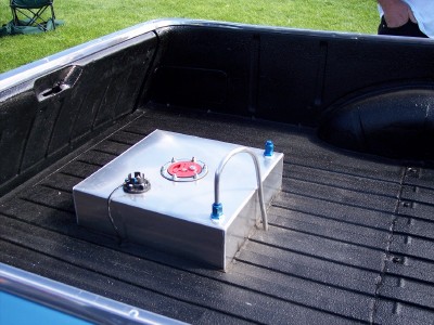 1972 Ford Ranchero - Aftermarket fuel tank installed in the bed of a pickup truck, likely for racing or custom modifications.