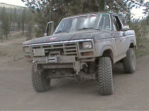 1985 Ford Bronco - Lots more to come as soon as I get the time. Solid front axle, home made brush guard, and 6 point roll cage