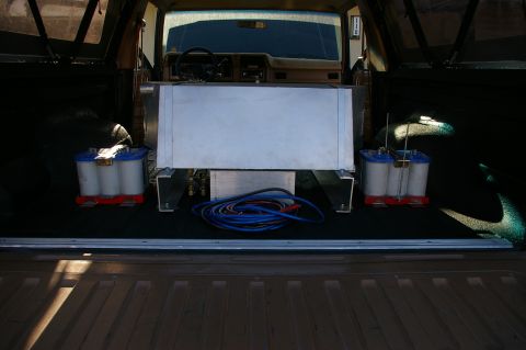 1986 Ford Bronco - Interior view of a 1986 Ford Bronco with an auxiliary fuel tank and batteries installed.