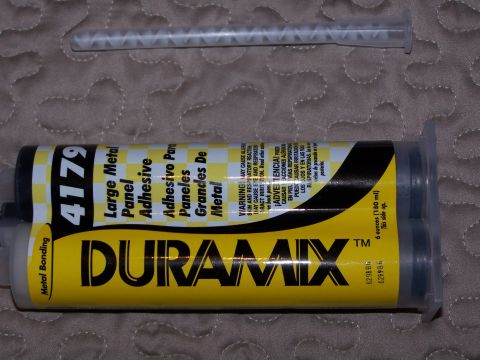1986 Ford Bronco - This photo shows a dual cartridge of Duramix large metal panel adhesive and a mixer tip.
