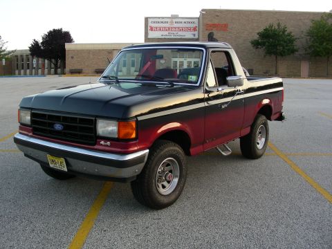 1990 Ford Bronco - My old high school in the background.