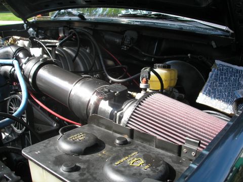 1994 Ford Bronco - Engine bay of a 1994 Ford Bronco with a K&N air filter and new intake piping installed.