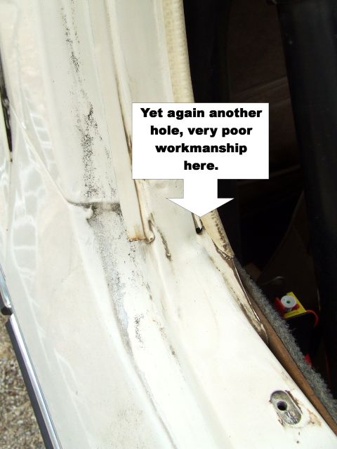 1979 Ford Bronco - Damage and poor workmanship noted on the interior door jamb of a vehicle.