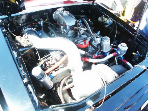 2001 Mercury Grand Marquis - Customized engine bay with performance modifications visible.