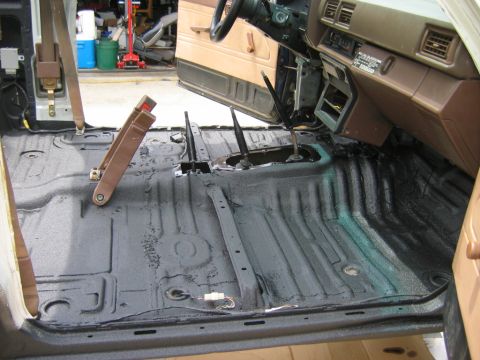 1985 Toyota 4Runner - The interior floor of a 1985 Toyota 4Runner has been stripped and coated, revealing the vehicle's structure.