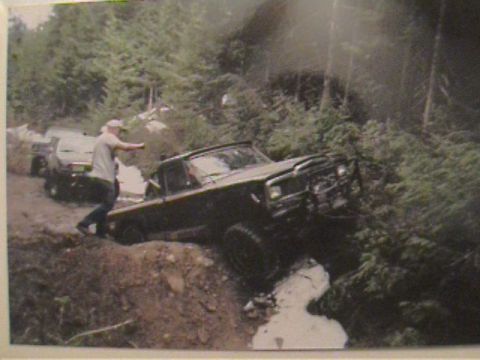 1985 Ford Bronco - Bill sleding over a burm!