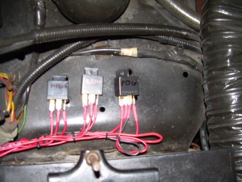 1984 Ford Bronco - Custom wiring with relays for vehicle lighting is visible in the engine compartment.