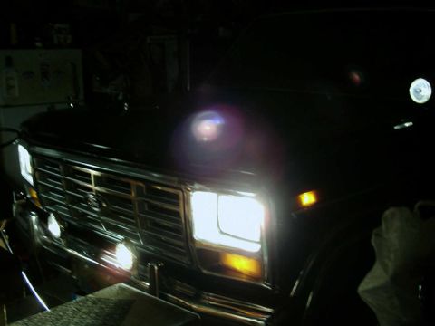1984 Ford Bronco - The grille and headlights of a 1984 Ford Bronco are visible in this front-facing photograph.