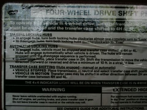 1984 Ford Bronco - A Ford decal provides instructions for operating a four-wheel-drive vehicle.