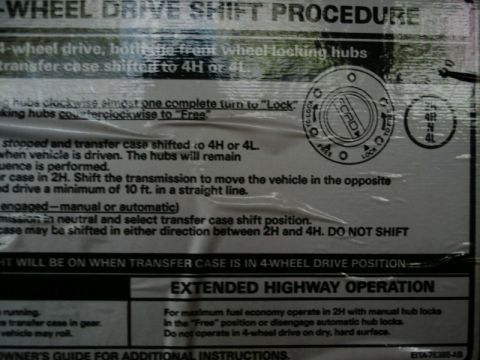 1984 Ford Bronco - Instructions for 4-wheel drive shift procedure and extended highway operation are printed on this document.