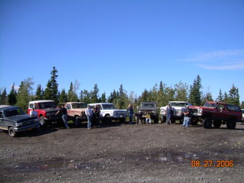 1978 Ford Bronco - Several Ford Broncos are gathered together outdoors on a sunny day.