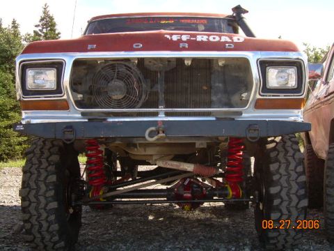 1978 Ford Bronco - Front view of a modified 1978 Ford Bronco with off-road suspension and tires.