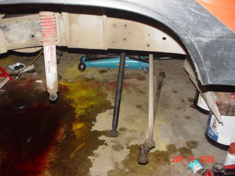 1978 Ford Bronco - Undercarriage view shows suspension components and a floor jack, with a date stamp of Jan 29, 2006.