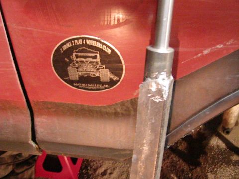 1978 Ford Bronco - A sticker on the side of a red vehicle reads '2 Broke 2 Play 4 Wheelers Club' and 'Matsu Valley, AK'.