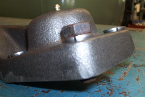 1983 Ford Bronco - This is a close-up view of a steering arm part, likely for a vehicle.
