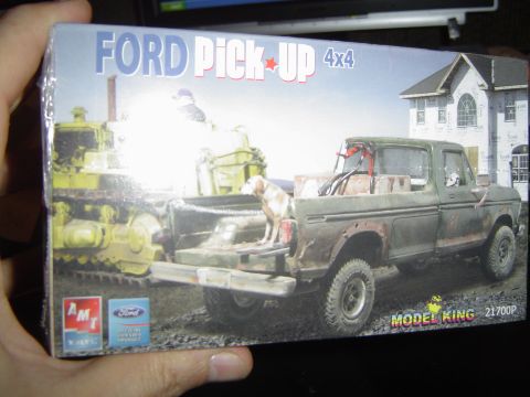 1989 Ford Bronco - This is a model kit box showing a Ford pickup truck and a bulldozer.