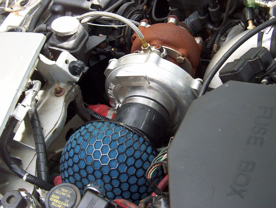 Engine bay with turbo and blue cone air filter