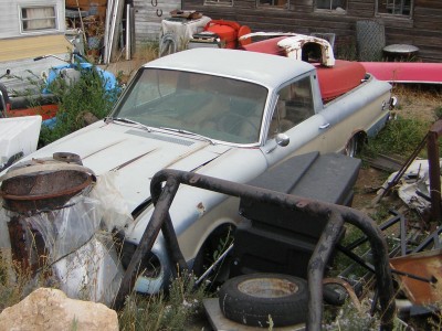 1972 Ford Ranchero - This 1972 Ford Ranchero is parked in a cluttered outdoor area.