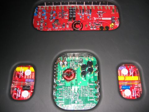 2004 Nissan 350Z - Heart of the system: DLS Amp, Orion amp, and DLS component crossovers (both opened). They are under plexiglass windows under black vinyl-wr…