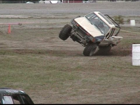 1985 Ford Bronco - Trying to zip through the barrels Will almost rolled. He managed to correct out of it.