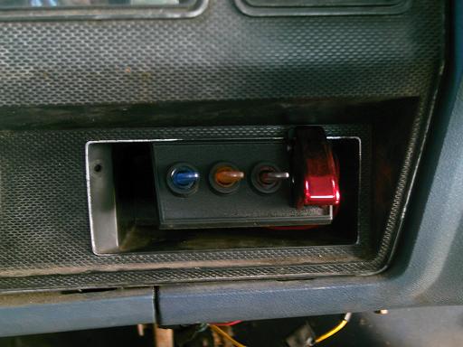 trailer hitch receiver with red safety chain hook