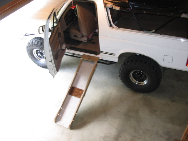 Pulled the carpet off, collected sand like crazy.  sprayed with a sandy non-slip paint