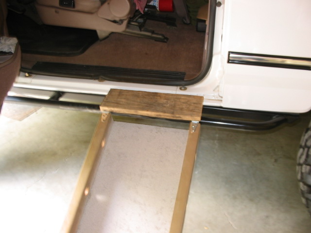 Didn't want a doggy paw getting stuck between the slider railing and body, so I added a little folding step