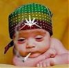 1989 Ford Bronco - A baby is depicted wearing a rasta-themed bandana and holding a cigarette in its mouth.