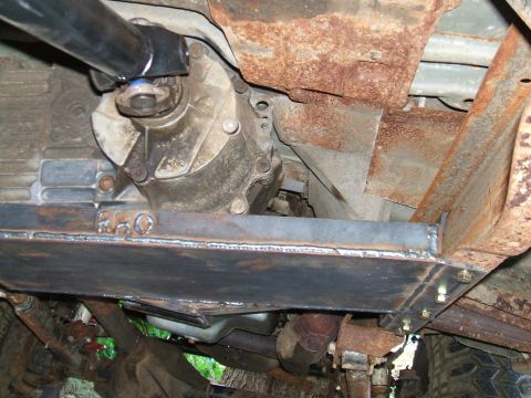 1995 Ford Bronco - A custom skid plate has been installed under the vehicle's transmission and drivetrain components.