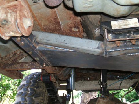 1995 Ford Bronco - Custom skid plate and suspension components are visible on the underbody of this vehicle.