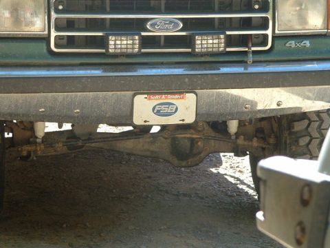 1990 Ford Bronco - Front view of a 1990 Ford Bronco, showing the grille, headlights, and "4x4" badging.