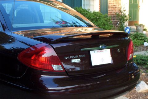2001 Ford Taurus - The back, proudly proclaiming the "Suck my Exhaust, you rice-fueled SHITHEAD" trim level, along with the spoiler.