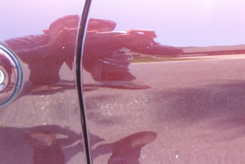 2001 Ford Taurus - Side scrapes, no big deal, little touchup paint and a wax will fix these up.