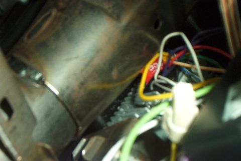 2001 Ford Taurus - An ugly mess, but you can see the back of the head unit, and the rear bracket.